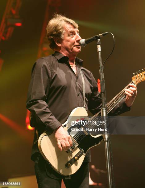 Rick Parfitt of Status Quo performs at Quofestive at BIC on December 9, 2012 in Bournemouth, England.