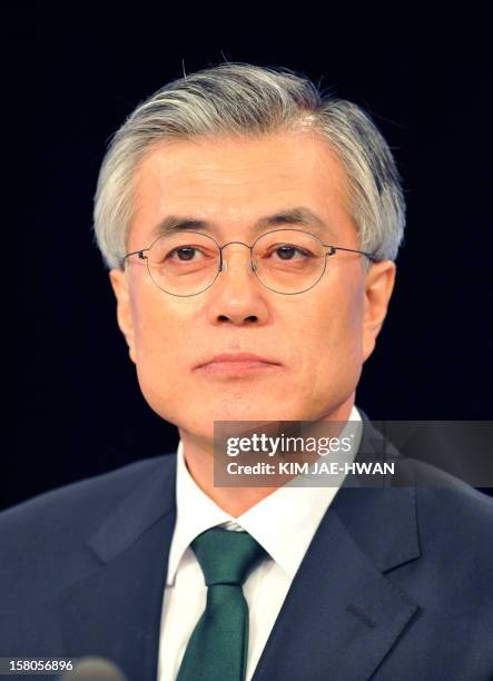 South Korea's presidential candidate Moon Jae-In of the main opposition Democratic United Party attends a televised debate in Seoul on December 10,...