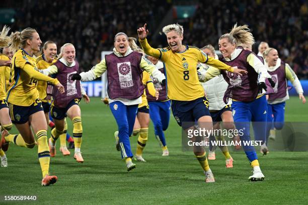Sweden's forward Lina Hurtig and teammates celebrate their win during the Australia and New Zealand 2023 Women's World Cup round of 16 football match...