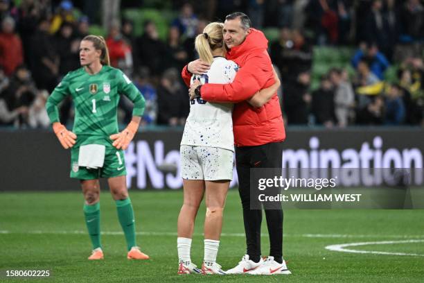 S coach Vlatko Andonovski comforts USA's midfielder Lindsey Horan at the end of the Australia and New Zealand 2023 Women's World Cup round of 16...