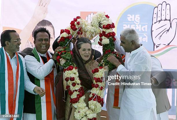 Congress leader Sonia Gandhi being greeted during an election campaign on December 10, 2012 in Siddhpur, India. Polls in Gujarat will take place in...