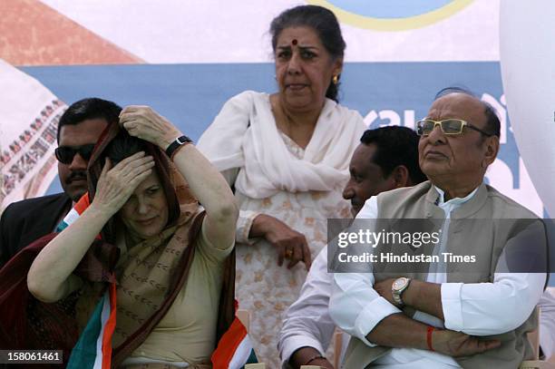 Congress leader Sonia Gandhi Shankar Singh Vaghela , former Gujarat chief minister and Ambika Soni during an election campaign on December 10, 2012...