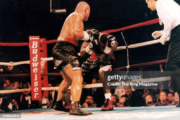 Tua Rope David Tua knocks Hasim Rahman into the ropes during the fight at the ...