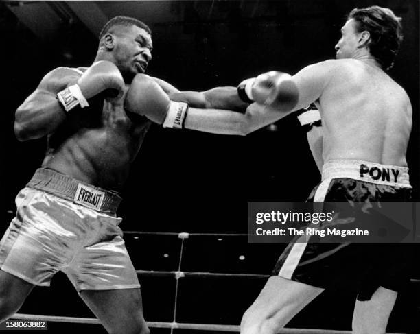 Mike Tyson lands a punch against David Jaco during the fight at the Plaza Convention Center,on January 11,1986 in Albany, New York. Mike Tyson won by...