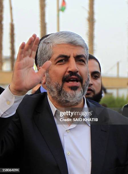 Hamas leader in exile Khaled Meshaal waves goodbye upon his departure from the Gaza Strip on December 10, 2012 in Rafah, on the border with Egypt....