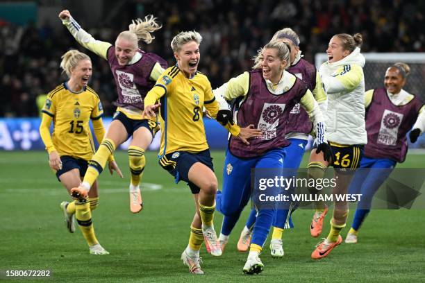 Sweden's players celebrate their win at the end of the Australia and New Zealand 2023 Women's World Cup round of 16 football match between Sweden and...