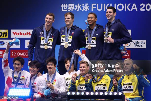 Gold medallists Team United States, silver medallists Team China and bronze medallists Team Australia pose during the medal ceremony for the Men's 4...