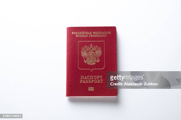 international and internal passports of a citizen of the russian federation. a ban on issuing schengen visas to russian tourists. travel ban. refusal to issue visas and residence permits. renunciation of citizenship. migration, emigration of russians. - canadian passport stock pictures, royalty-free photos & images