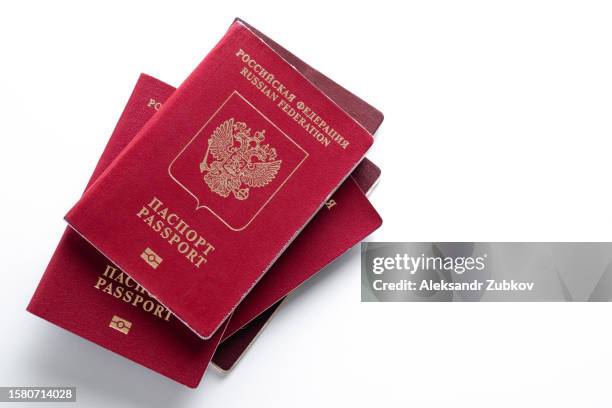 international and internal passports of a citizen of the russian federation. a ban on issuing schengen visas to russian tourists. travel ban. refusal to issue visas and residence permits. renunciation of citizenship. migration, emigration of russians. - canada passport stock pictures, royalty-free photos & images