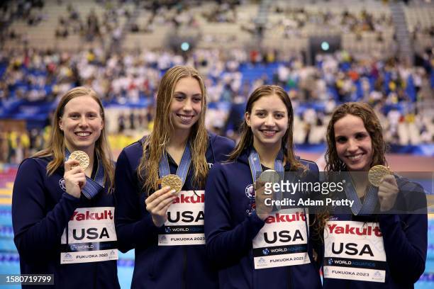Gold medallists Regan Smith, Lilly King, Gretchen Walsh and Kate Douglass of Team United States pose during the medal ceremony for the Women's 4 x...
