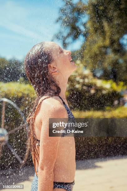 shower - girl shower stock pictures, royalty-free photos & images