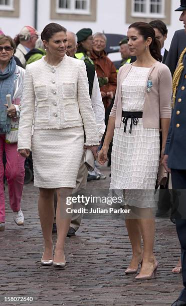 Crown Princess Victoria Of Sweden, And Crown Princess Mary Of Denmark Watch A Parade At Fredensborg Palace, To Celebrate Prince Henriks 75Th Birthday.