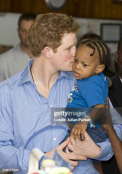 Prince Harry Visiting The Queen Elizabeth Ii Hospital In Bridgetown, Barbados, Visited The Children'S Ward And Met A Number Of Children.Seen Holding...