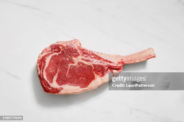 the king of steaks "the tomahawk" - tomahawk stock pictures, royalty-free photos & images