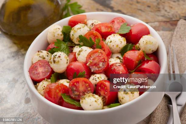 tomato and mozzarella salad - italien food stock pictures, royalty-free photos & images