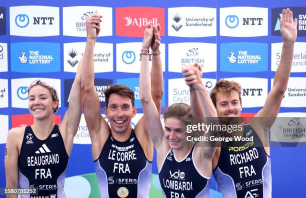 Cassandre Beaugrand, Pierre Le Corre, Emma Lombardi and Tom Richard of Team France celebrate winning Gold on the podium following the Elite Mixed...