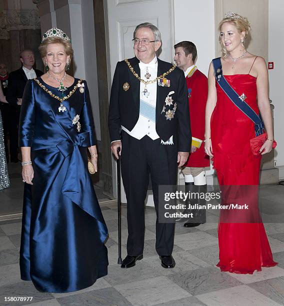 ** ** King Constantine Of Greece And Queen Anne Marie Of Greece With Princess Theodora Of Greece Arriving At A Gala Dinner At Christiansborg Palace...