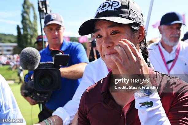 Celine Boutier of France celebrates following victory in the Amundi Evian Championship at Evian Resort Golf Club on July 30, 2023 in Evian-les-Bains,...