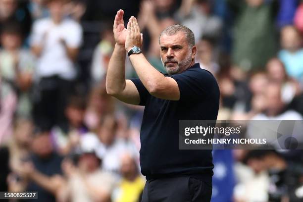 Tottenham Hotspur's Greek-Australian Head Coach Ange Postecoglou is introduced ahead of the pre-season friendly football match between Tottenham...