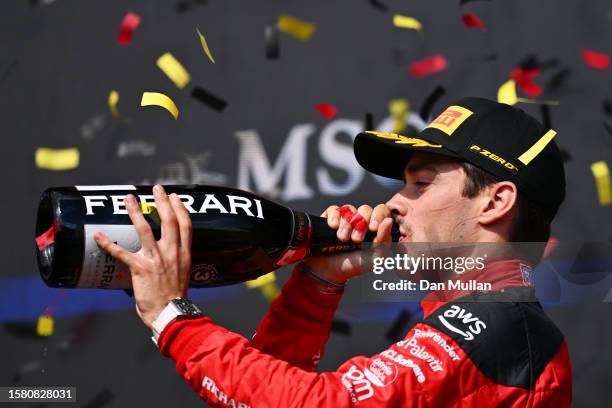 Third placed Charles Leclerc of Monaco and Ferrari celebrates on the podium during the F1 Grand Prix of Belgium at Circuit de Spa-Francorchamps on...