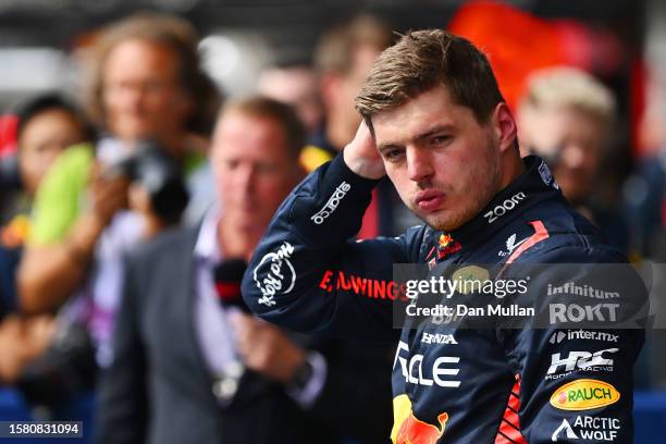 Race winner Max Verstappen of the Netherlands and Oracle Red Bull Racing looks on in parc ferme during the F1 Grand Prix of Belgium at Circuit de...