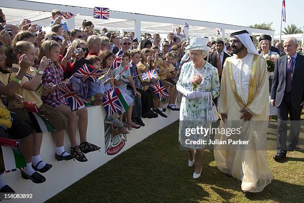 Queen Elizabeth Attends An Unveiling Of A Design For The Shiekh Zayed National Museum And Look At Other Projects In An Exhibition And After Took A...