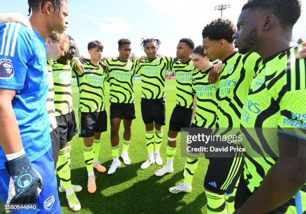 The Arsenal players form a huddle before a pre season friendly between Boreham Wood and Arsenal U21 at Meadow Park on July 29, 2023 in Borehamwood,...