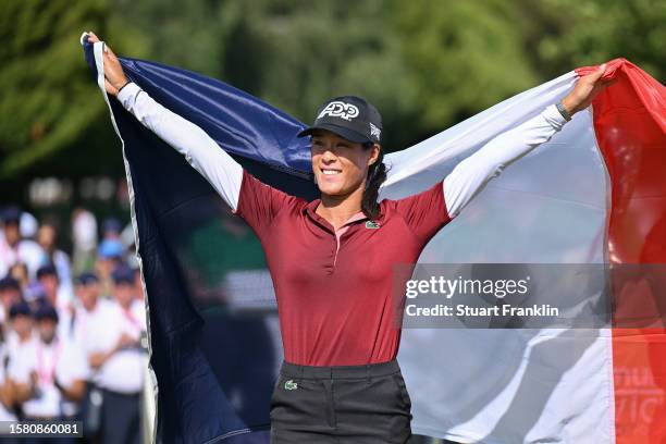 Celine Boutier of France celebrates following victory in the Amundi Evian Championship at Evian Resort Golf Club on July 30, 2023 in Evian-les-Bains,...