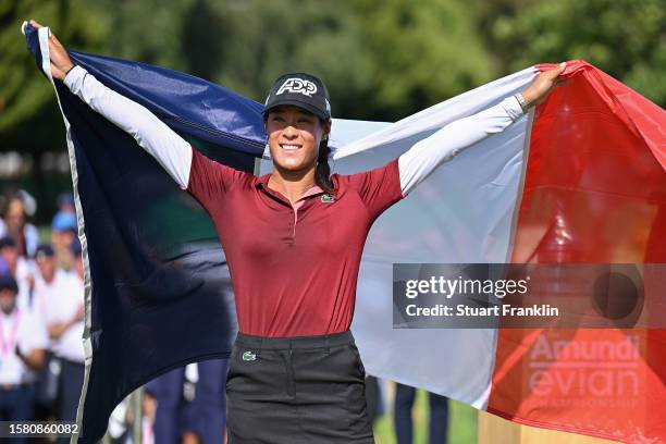 Celine Boutier of France celebrates following victory in the Amundi Evian Championship at Evian Resort Golf Club on July 30, 2023 in Evian-les-Bains,...