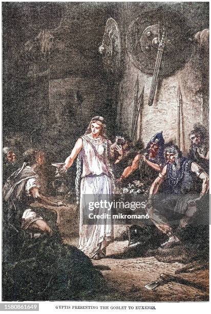 old engraved illustration of wedding day of the princess gyptis (or petta) the daughter of nannus, chief of the native segobrigii, to the phocaean sailor protis (or euxenus) the princess giving him a bowl filled with wine or water during the feast - ancient greek alphabet stock-fotos und bilder