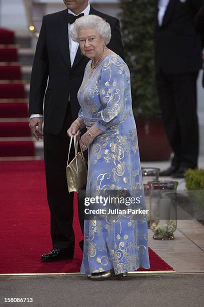 Queen Elizabeth Ii Attends A Pre Wedding Party, On The Eve Of Prince Williams Wedding To Kate Middleton, At The Mandarin Oriental Hotel In Central...