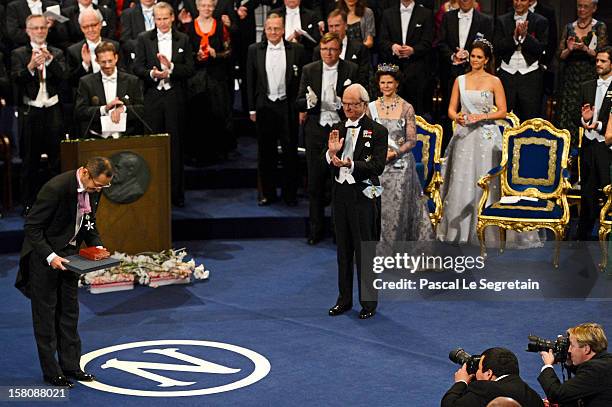 Nobel Laureate, Professor Shinya Yamanaka of Japan acknowledges the applause after receiving the 2012 Nobel Prize for Medicine from King Carl XVI...