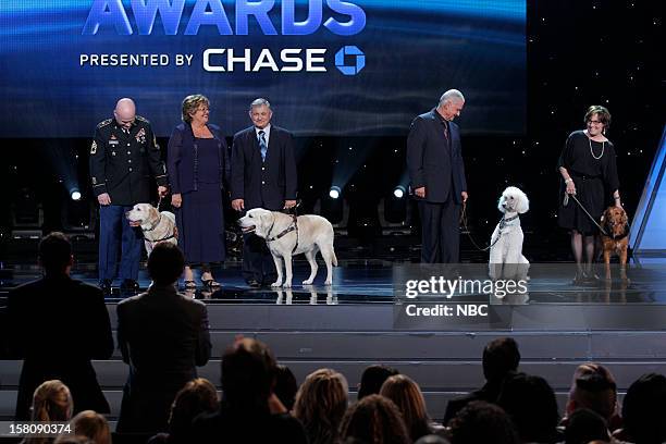 Pictured: Sgt. First Class Charles Shuck, Gabe , Pam & Jim Hogan, Atticus , Michael Flagg, Penny Lane , Judy Fridono, Ricochet --