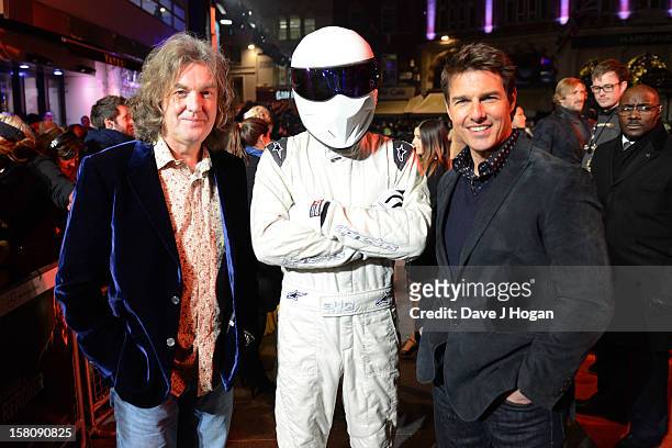 James May, The Stig and Tom Cruise attend the world premiere of "Jack Reacher" at The Odeon Leicester Square on December 10, 2012 in London, England.