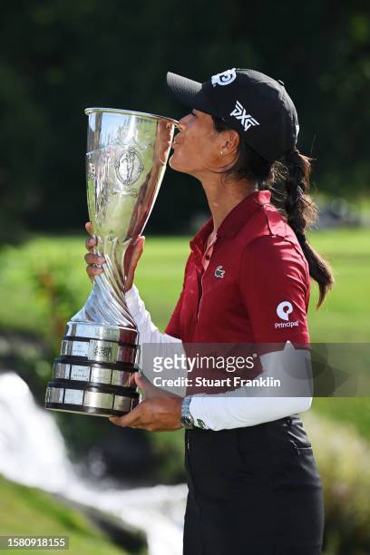 Celine Boutier of France kisses the Amundi Evian Championship trophy following victory in the Amundi Evian Championship at Evian Resort Golf Club on...