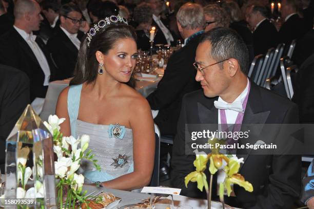 Princess Madeleine of Sweden speaks with laureate and Nobel Prize winner for Medicine, Professor Shinya Yamanaka of Japan during the Nobel Banquet...