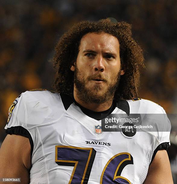 Offensive lineman Jah Reid of the Baltimore Ravens looks on from the sideline during a game against the Pittsburgh Steelers at Heinz Field on...