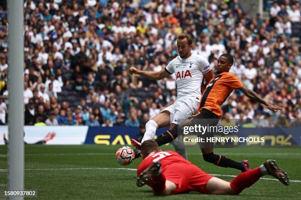 Tottenham Hotspur's English striker Harry Kane scores his fourth goal during the pre-season friendly football match between Tottenham Hotspur and...