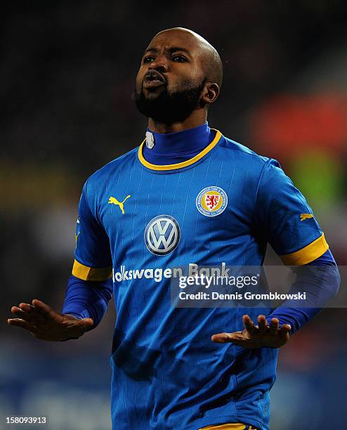 Dominik Kumbela of Braunschweig celebrates after scoring his team's first goal during the Bundesliga match between 1. FC Koeln and Eintracht...