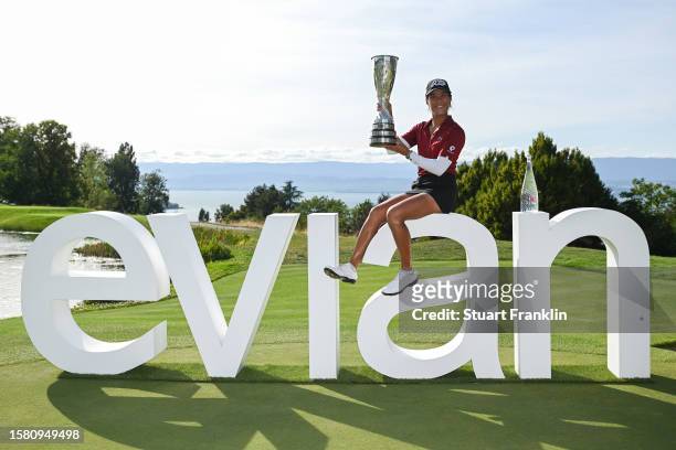 Celine Boutier of France celebrates with the Amundi Evian Championship trophy following victory in the Amundi Evian Championship at Evian Resort Golf...