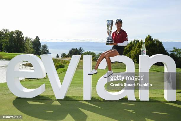 Celine Boutier of France celebrates with the Amundi Evian Championship trophy following victory in the Amundi Evian Championship at Evian Resort Golf...