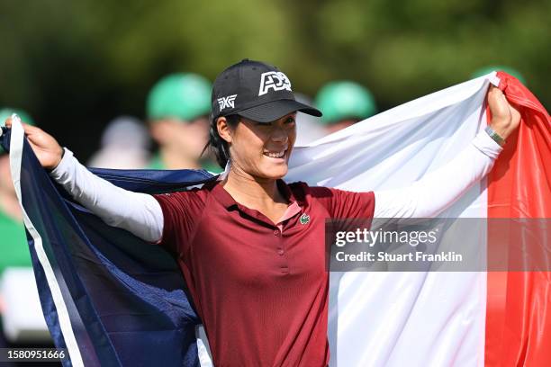 Celine Boutier of France celebrates following victory in the Amundi Evian Championship at Evian Resort Golf Club on July 30, 2023 in Evian-les-Bains,...