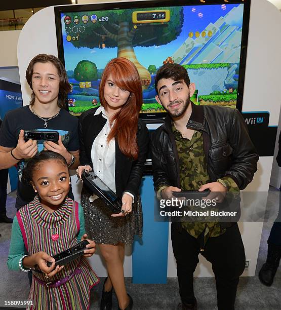 Leo Howard, Skai Jackson, Debby Ryan and Mateo Arias stars of Disney XD’s hit series "Kickin’ It" gets ready to battle in the Wii U Showdown at...