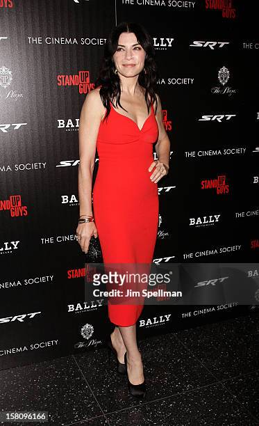 Actress Julianna Margulies attends The Cinema Society With Chrysler & Bally premiere of "Stand Up Guys" at Museum of Modern Art on December 9, 2012...