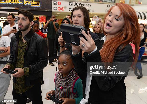 Leo Howard, Skai Jackson, Mateo Arias and Debby Ryan stars of Disney XD’s hit series "Kickin’ It" gets ready to battle in the Wii U Showdown at...