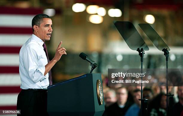 President Barack Obama speaks about the economy at the Daimler Detroit Diesel engine plant December 10, 2012 in Redford, Michigan. The President and...