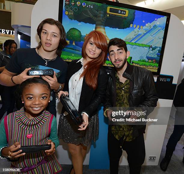 Leo Howard, Skai Jackson, Debby Ryan and Mateo Arias stars of Disney XD’s hit series "Kickin’ It" gets ready to battle in the Wii U Showdown at...