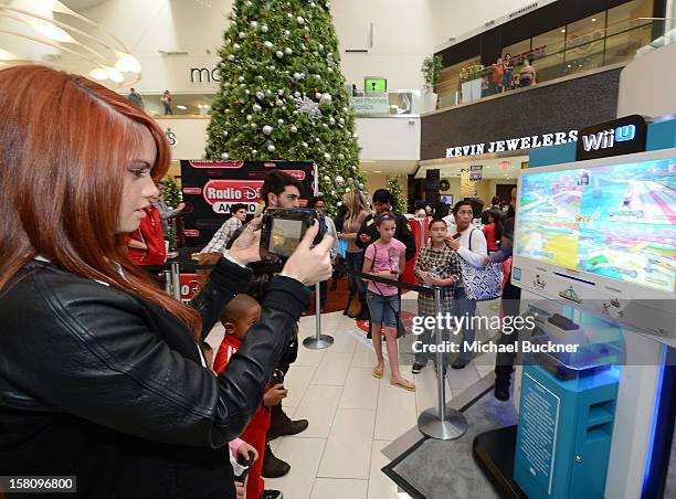 Debby Ryan star of Disney XD’s hit series "Kickin’ It" gets ready to battle in the Wii U Showdown at Westfield Century City Mall in Los Angeles on...