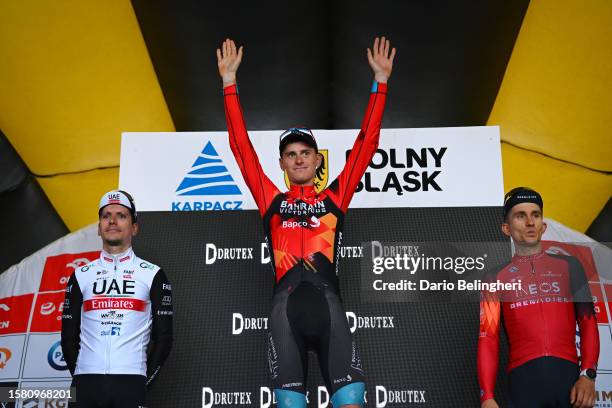 João Almeida of Portugal and UAE Team Emirates on second place, stage winner Matej Mohorič of Slovenia and Team Bahrain - Victorious and Michał...