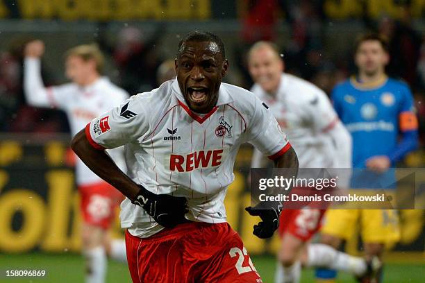 Anthony Ujah of Cologne celebrates after scoring his team's second goal during the Bundesliga match between 1. FC Koeln and Eintracht Braunschweig at...